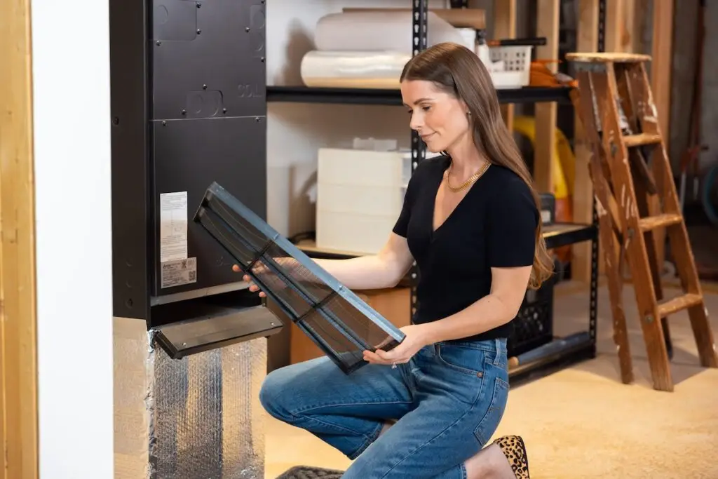 woman checking a air filter
