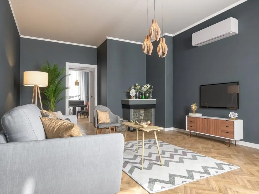 well furnished living room with an air conditioning unit